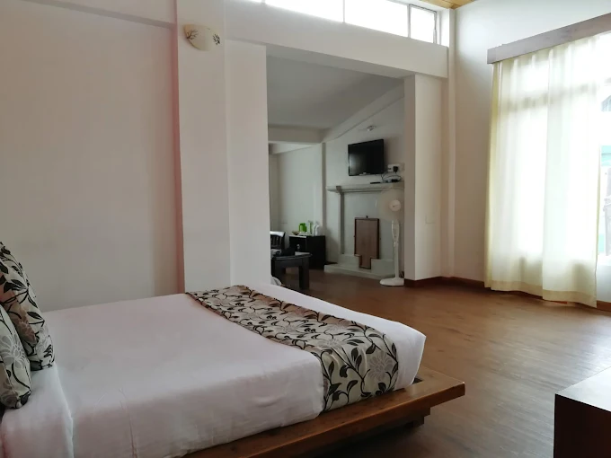 Deluxe Hotels: Kaizun Bed and Breakfast/Quinton Enclave Annexe (Cottage)/TreeTops Residency/Hotel Island Park Residency or Similar